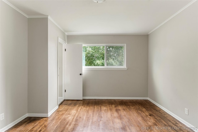 2904 S Hudson Pl, Tulsa, OK 74114 - spare room with wood finished floors and crown molding
