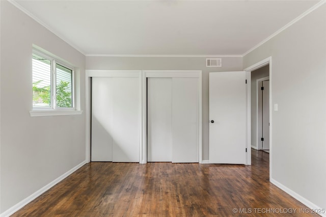 2904 S Hudson Pl, Tulsa, OK 74114 - unfurnished bedroom with wood finished floors and ornamental molding