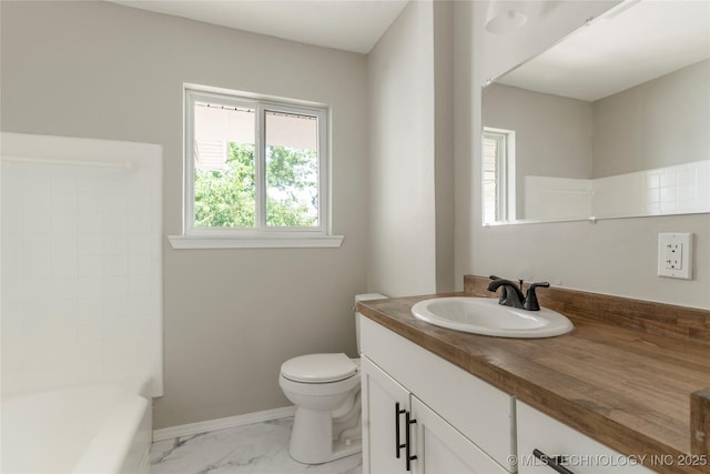 2904 S Hudson Pl, Tulsa, OK 74114 - bathroom with vanity, healthy amount of natural light, marble look tile flooring, and a tub to relax in