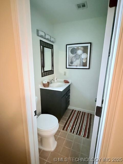 31990 S 624th Pl Unit 65, Grove, OK 74344 - bathroom with vanity and tile patterned floors