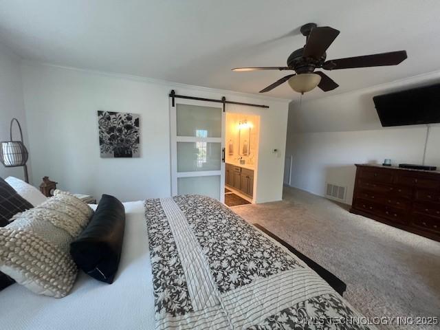 31990 S 624th Pl Unit 65, Grove, OK 74344 - carpeted bedroom featuring a barn door, ceiling fan, and ornamental molding