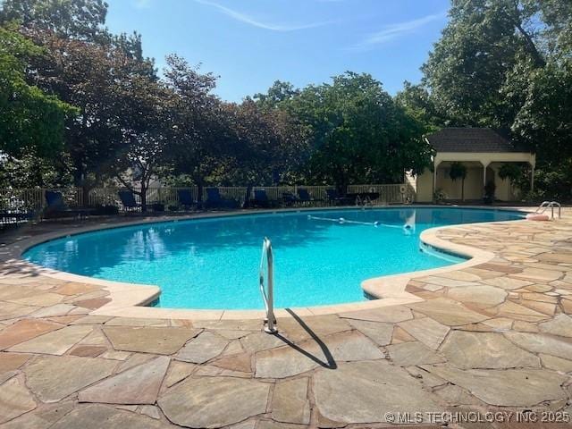 31990 S 624th Pl Unit 65, Grove, OK 74344 - community pool with a patio