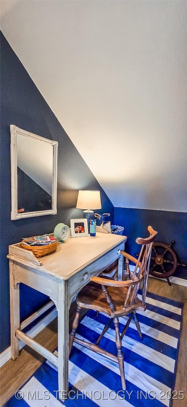 108256 Pike St, Checotah, OK 74426 - dining area with vaulted ceiling, wood finished floors, and a desk