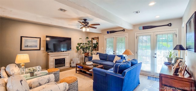 108256 Pike St, Checotah, OK 74426 - living area featuring french doors, beam ceiling, healthy amount of natural light, ceiling fan, and recessed lighting