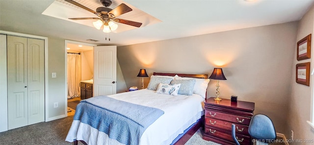 108256 Pike St, Checotah, OK 74426 - bedroom with carpet, a ceiling fan, a closet, and connected bathroom
