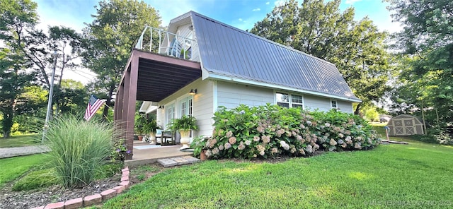 108256 Pike St, Checotah, OK 74426 - view of property exterior with a shed, a lawn, a metal roof, and a deck