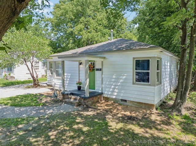 2837 E Admiral Ct, Tulsa, OK 74110 - view of front facade with crawl space and roof with shingles