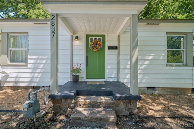 2837 E Admiral Ct, Tulsa, OK 74110 - view of exterior entry with crawl space