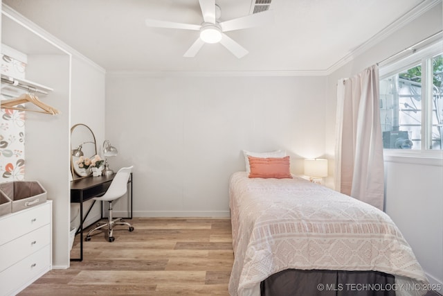 2837 E Admiral Ct, Tulsa, OK 74110 - bedroom featuring light wood-style flooring, ornamental molding, and ceiling fan