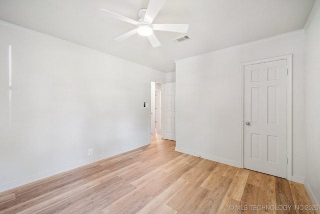 2837 E Admiral Ct, Tulsa, OK 74110 - empty room with light wood-style floors and a ceiling fan