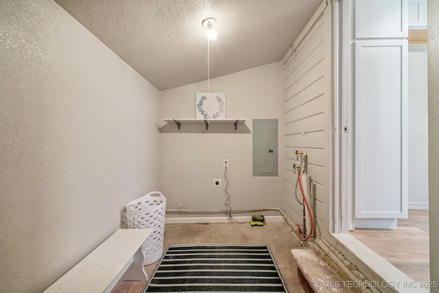 2837 E Admiral Ct, Tulsa, OK 74110 - laundry room featuring electric panel and a textured ceiling