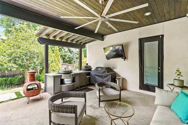 4603 E 118th Pl, Tulsa, OK 74137 - view of patio / terrace with a ceiling fan and exterior kitchen