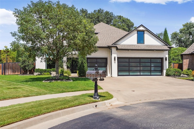 4603 E 118th Pl, Tulsa, OK 74137 - view of front of property featuring stucco siding, driveway, a garage, and roof with shingles