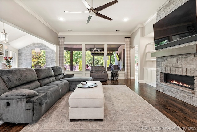 4603 E 118th Pl, Tulsa, OK 74137 - living area featuring a ceiling fan, wood finished floors, a fireplace, ornamental molding, and lofted ceiling