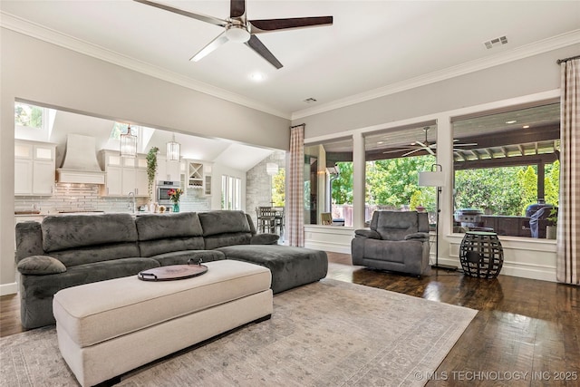 4603 E 118th Pl, Tulsa, OK 74137 - living area featuring ceiling fan, dark wood finished floors, crown molding, and recessed lighting
