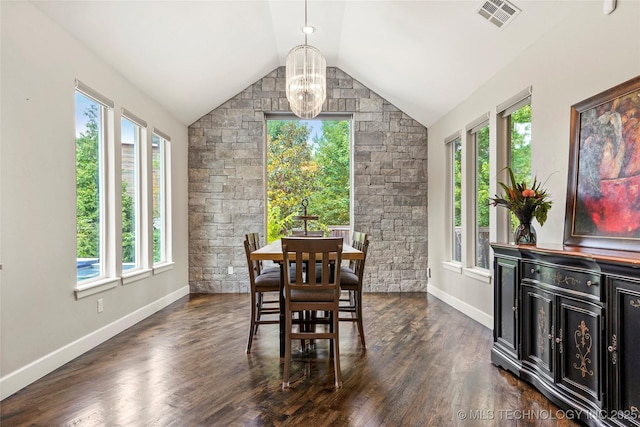 4603 E 118th Pl, Tulsa, OK 74137 - dining space featuring plenty of natural light, a chandelier, lofted ceiling, and dark wood-style floors
