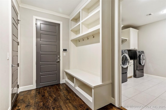 4603 E 118th Pl, Tulsa, OK 74137 - mudroom featuring washing machine and dryer and wood finished floors