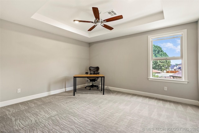 4603 E 118th Pl, Tulsa, OK 74137 - unfurnished office with a tray ceiling, carpet flooring, and ceiling fan