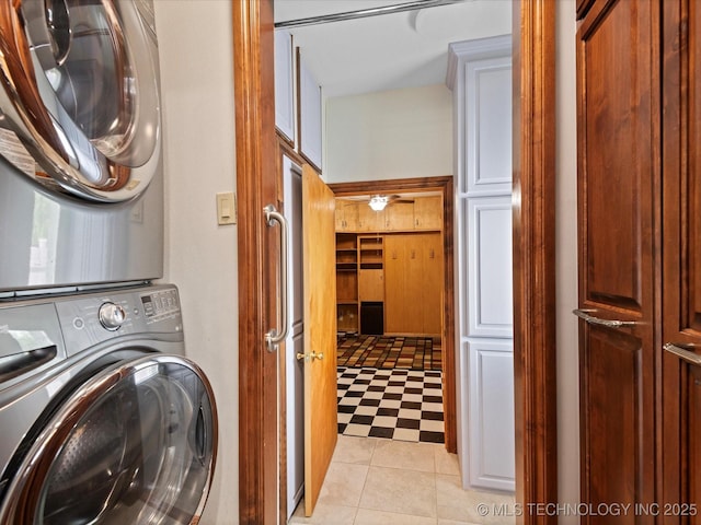 927 Macklyn Ln, Bartlesville, OK 74006 - laundry room featuring stacked washer / dryer