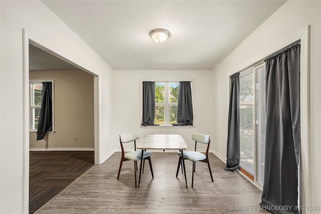 2900 S Cedar Ct, Broken Arrow, OK 74012 - dining room featuring baseboards and wood finished floors