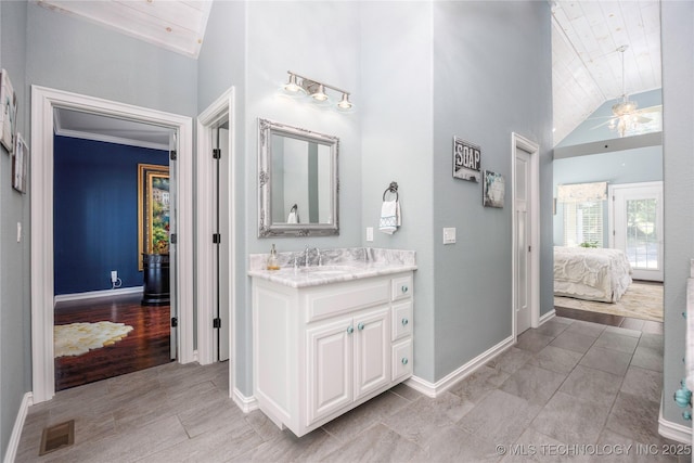 1528 Smysor Dr, Bartlesville, OK 74006 - ensuite bathroom with lofted ceiling, vanity, ceiling fan, and wooden ceiling