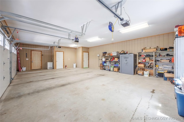 1528 Smysor Dr, Bartlesville, OK 74006 - garage featuring a garage door opener