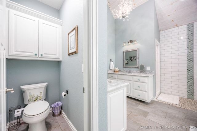 1528 Smysor Dr, Bartlesville, OK 74006 - full bath with vanity, tiled shower, and a chandelier