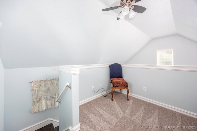 1528 Smysor Dr, Bartlesville, OK 74006 - unfurnished room with an upstairs landing, lofted ceiling, carpet floors, and a ceiling fan