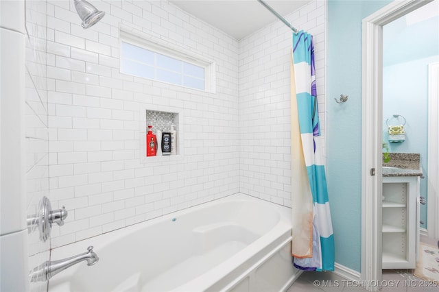 1528 Smysor Dr, Bartlesville, OK 74006 - bathroom with shower / bath combination with curtain and baseboards