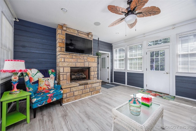 1528 Smysor Dr, Bartlesville, OK 74006 - sunroom / solarium with a fireplace and ceiling fan