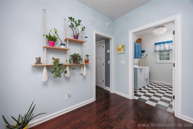 1528 Smysor Dr, Bartlesville, OK 74006 - corridor with washing machine and dryer, tile patterned floors, and a chandelier