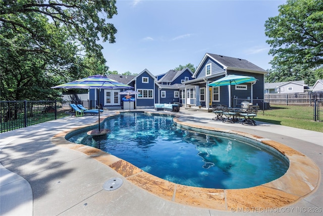 1528 Smysor Dr, Bartlesville, OK 74006 - view of swimming pool featuring a patio and french doors