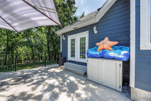 1528 Smysor Dr, Bartlesville, OK 74006 - wooden terrace with entry steps and a patio area