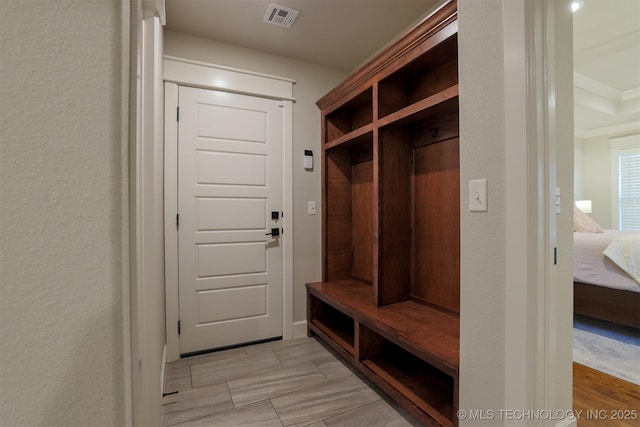7141 E 138th Pl, Collinsville, OK 74021 - mudroom featuring crown molding