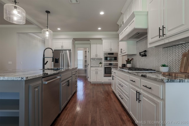 7141 E 138th Pl, Collinsville, OK 74021 - kitchen with appliances with stainless steel finishes, custom exhaust hood, ornamental molding, white cabinetry, and backsplash