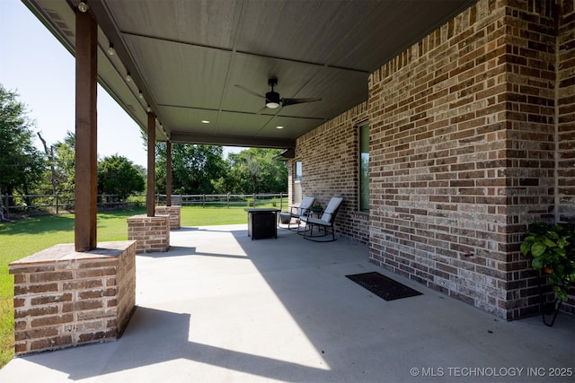 7141 E 138th Pl, Collinsville, OK 74021 - view of patio / terrace featuring a ceiling fan
