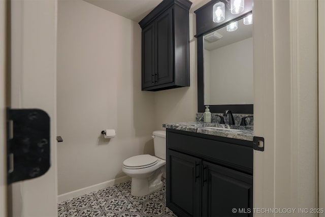 7141 E 138th Pl, Collinsville, OK 74021 - half bathroom with vanity and tile patterned flooring