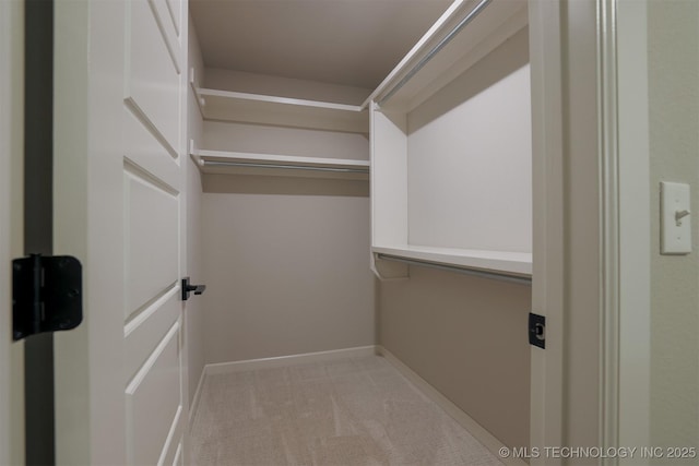 7141 E 138th Pl, Collinsville, OK 74021 - spacious closet with carpet flooring
