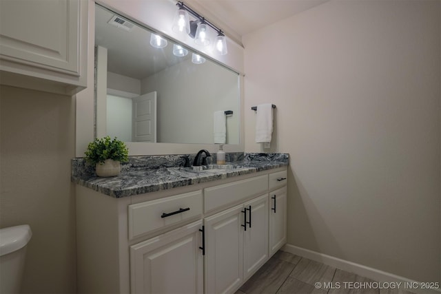 7141 E 138th Pl, Collinsville, OK 74021 - bathroom with vanity and toilet