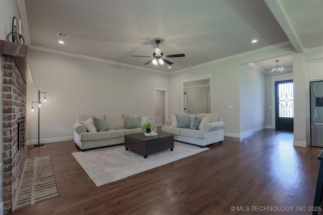 7141 E 138th Pl, Collinsville, OK 74021 - living area featuring a ceiling fan, dark wood-style flooring, a fireplace, a chandelier, and recessed lighting
