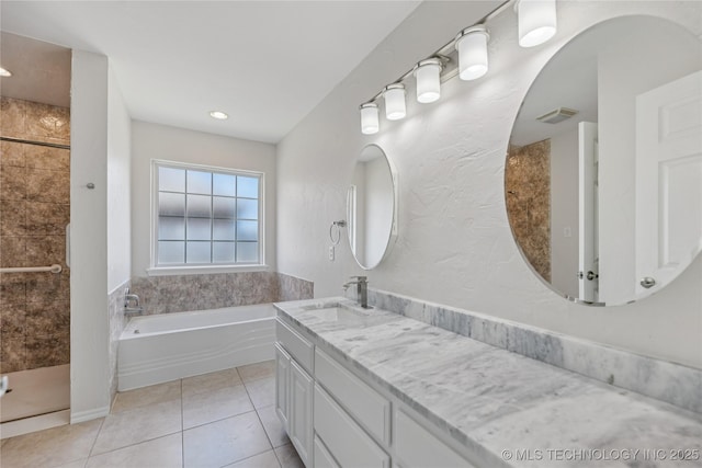 2629 S 13th St, Broken Arrow, OK 74012 - full bath with a garden tub, double vanity, a shower stall, and tile patterned flooring