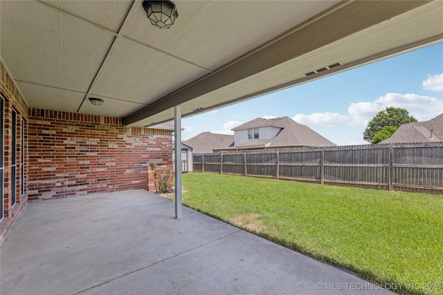 2629 S 13th St, Broken Arrow, OK 74012 - fenced backyard with a patio area