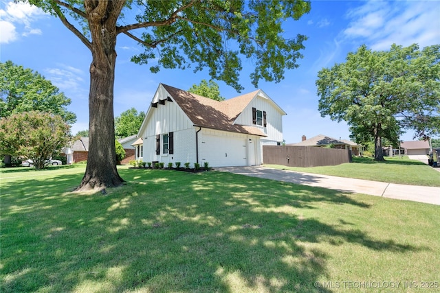 1400 W Jackson St, Broken Arrow, OK 74012 - view of side of home with board and batten siding, driveway, brick siding, and an attached garage