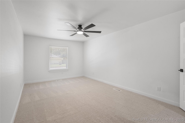 1400 W Jackson St, Broken Arrow, OK 74012 - spare room with a ceiling fan and light carpet