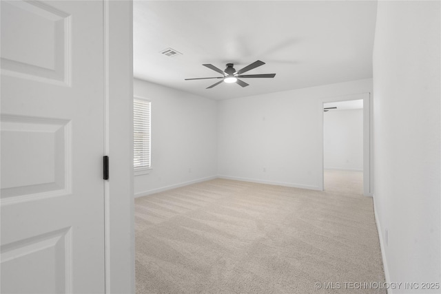 1400 W Jackson St, Broken Arrow, OK 74012 - carpeted empty room featuring a ceiling fan and baseboards
