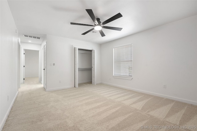 1400 W Jackson St, Broken Arrow, OK 74012 - unfurnished bedroom with light carpet, a closet, and a ceiling fan