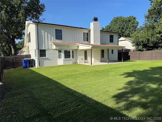 1400 W Jackson St, Broken Arrow, OK 74012 - rear view of property featuring a patio area, board and batten siding, a chimney, and a fenced backyard