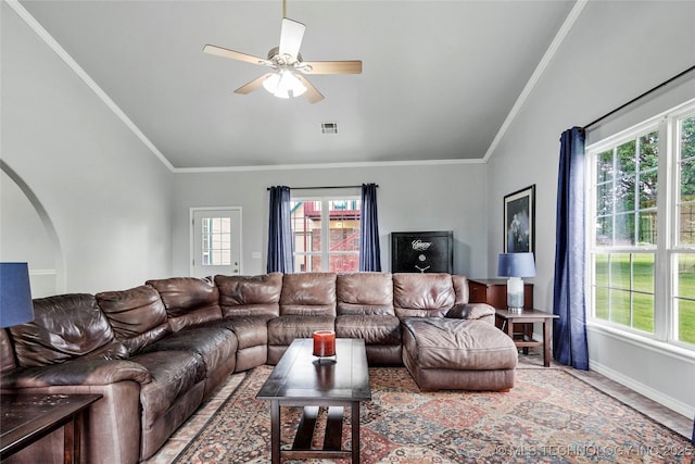10672 E Canyon Oaks Ct, Claremore, OK 74017 - living area featuring healthy amount of natural light, ornamental molding, a ceiling fan, and vaulted ceiling