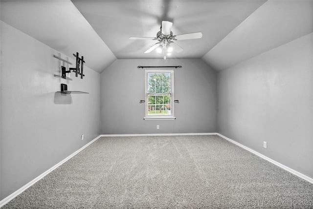 10672 E Canyon Oaks Ct, Claremore, OK 74017 - additional living space featuring vaulted ceiling, ceiling fan, and carpet floors