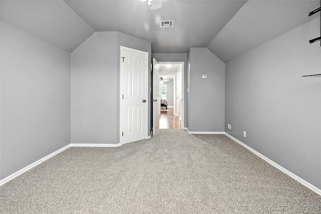 10672 E Canyon Oaks Ct, Claremore, OK 74017 - bonus room with carpet flooring, vaulted ceiling, and ceiling fan